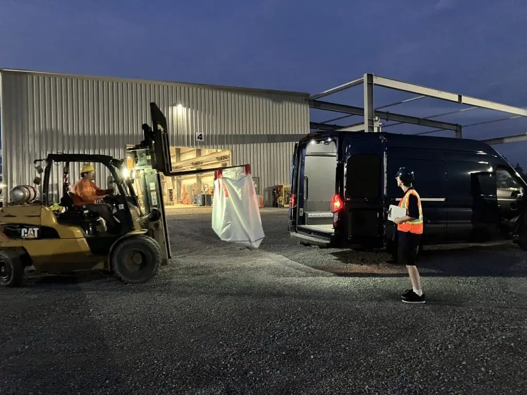 Loading a shipment into a Reliable Deliveries van